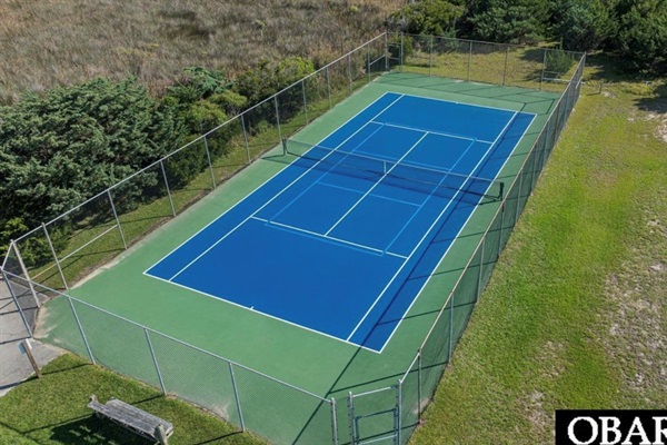  Bring your racquets our community pickleball & tennis court across the street