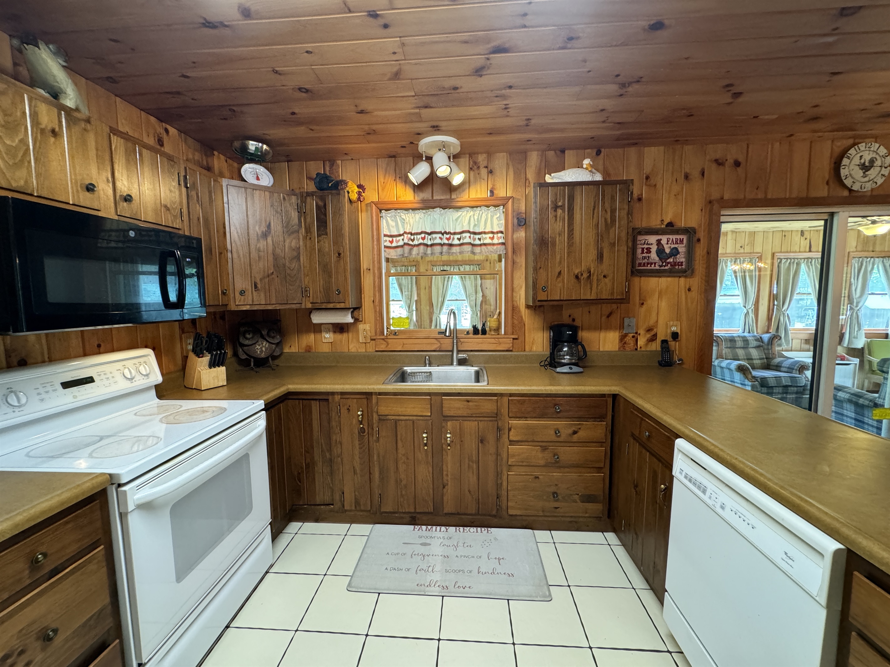 Kitchen looking into Sunroom