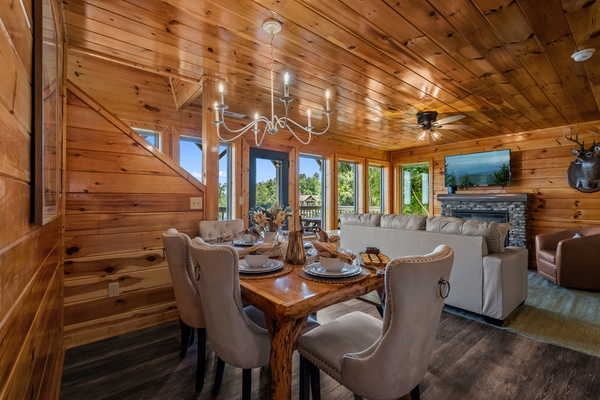 Open-concept dining and living area with mountain views