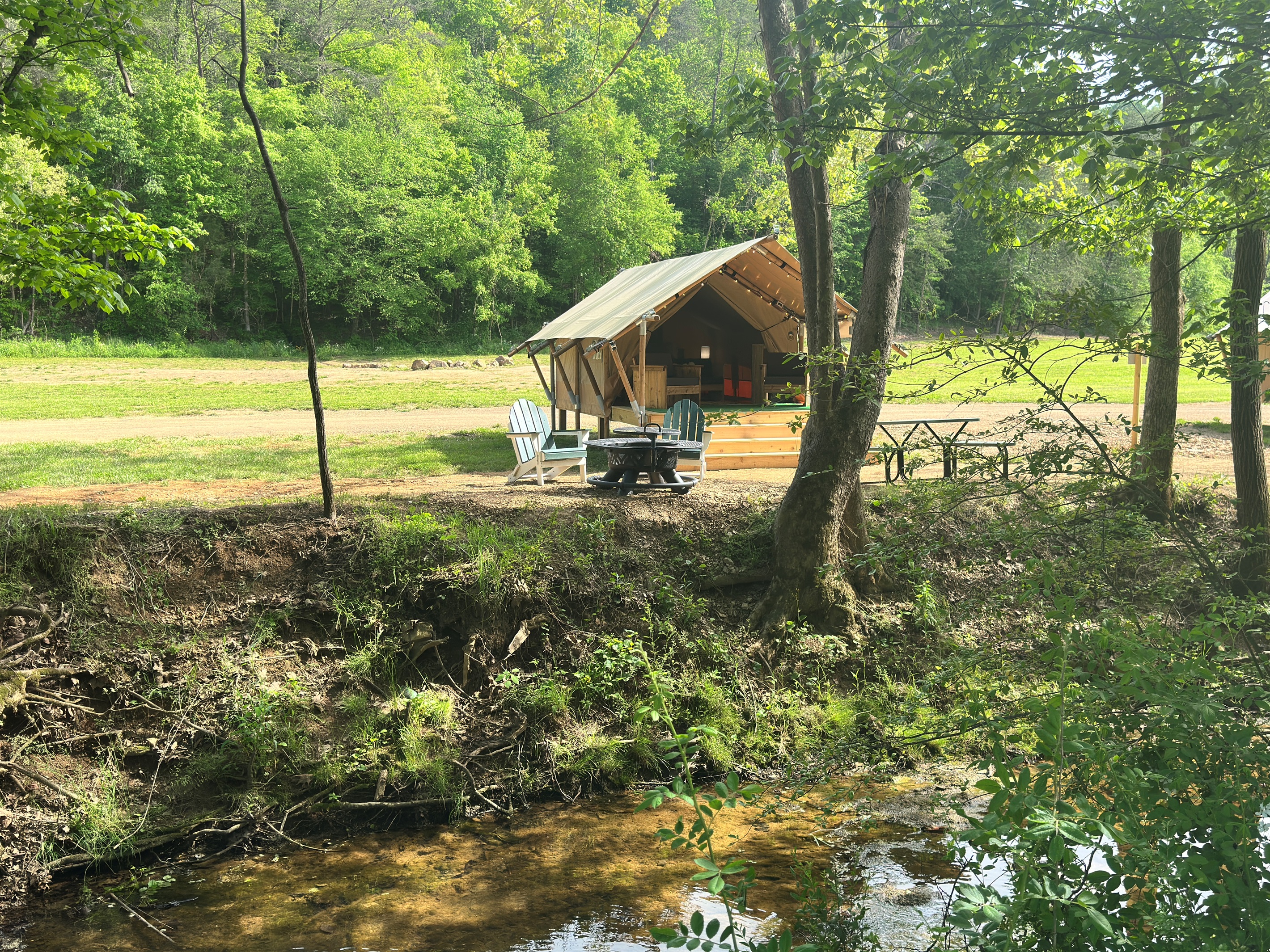 Taurus features a queen bed, love seat, and private bath cabinet