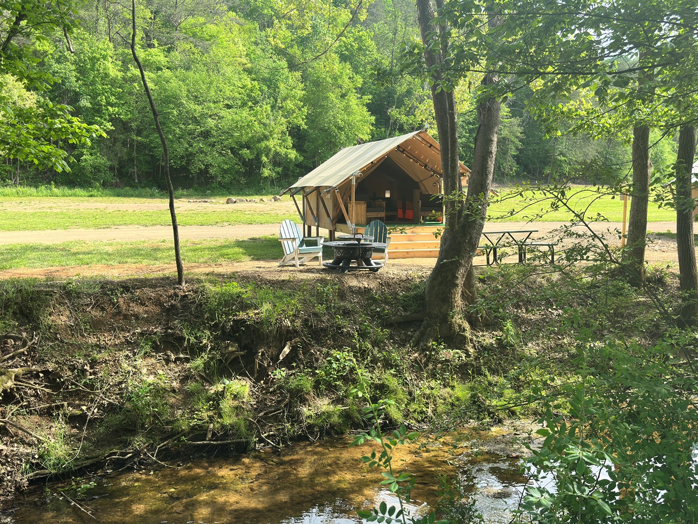 Taurus features a queen bed, love seat, and private bath cabinet