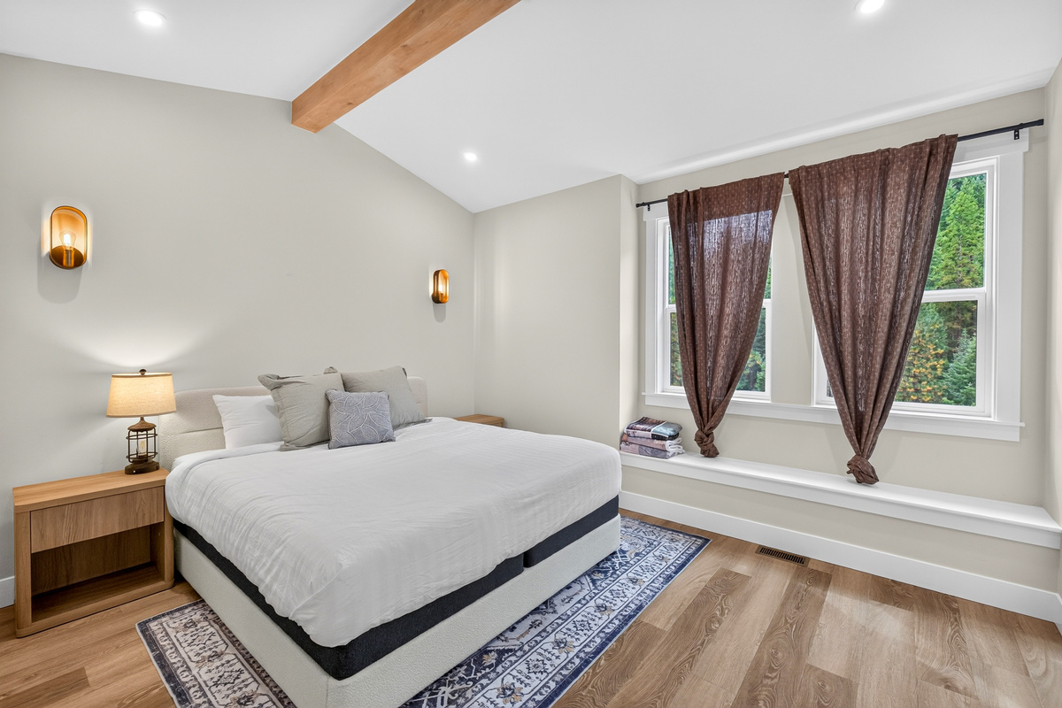 Rest like kings and queens in this king size bed located on the second floor just outside the family room.