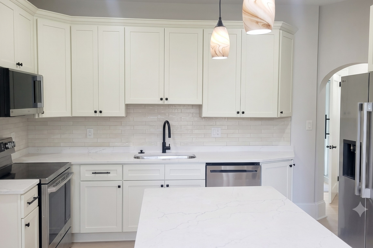 Chef's kitchen with real wood cabinets, stainless steel appliances, and all the supplies needed to feel like home