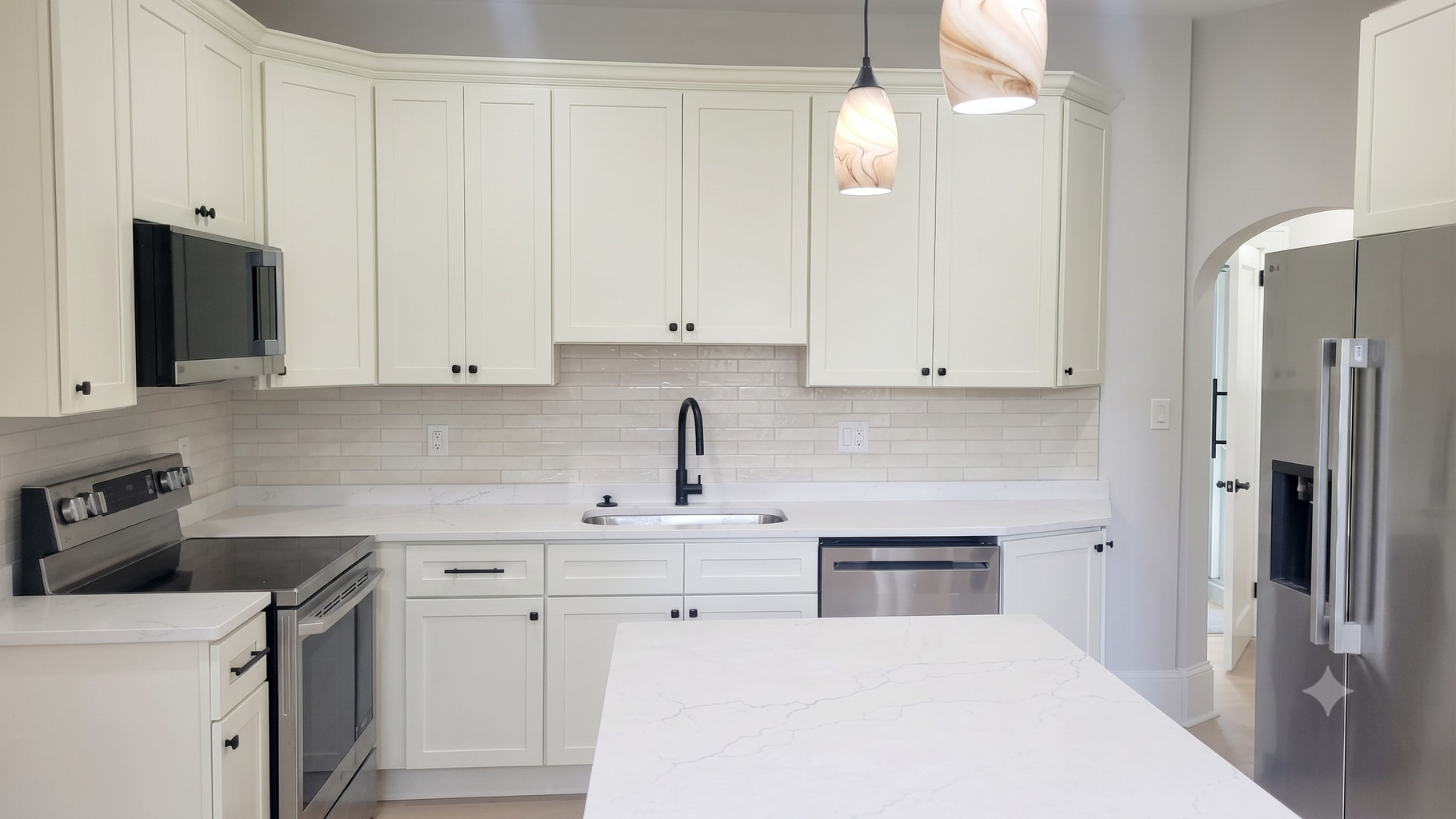 Chef's kitchen with real wood cabinets, stainless steel appliances, and all the supplies needed to feel like home