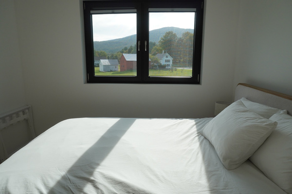 This bedroom has some great views.