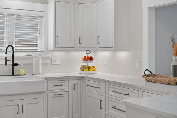 Fully equipped chef's kitchen with sleek finishes, generous storage, and modern appliances.