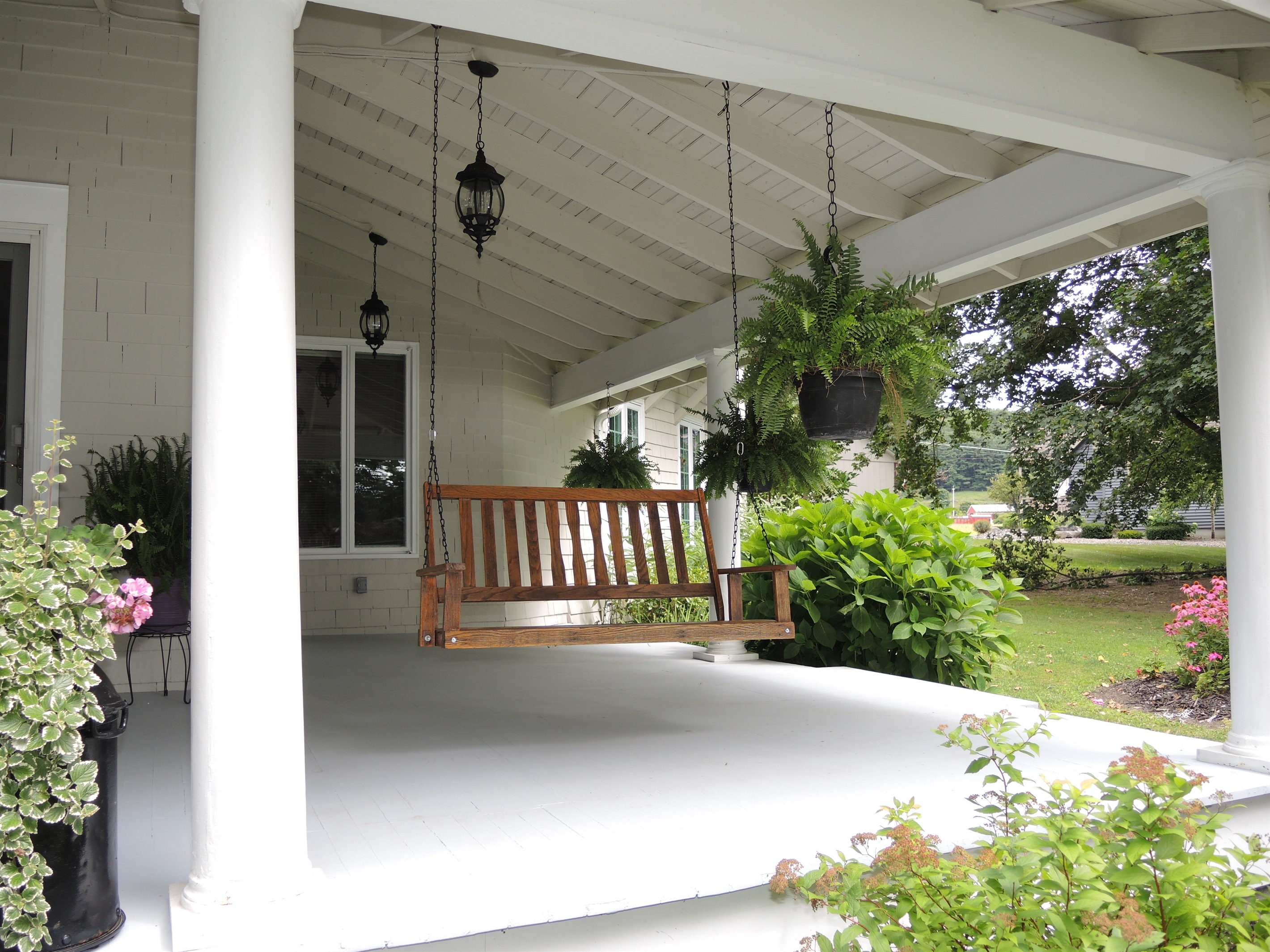 Private porch swing overlooking the water