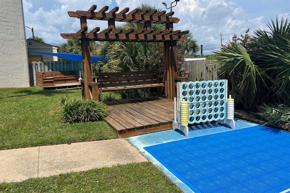 Swing by outdoor game area