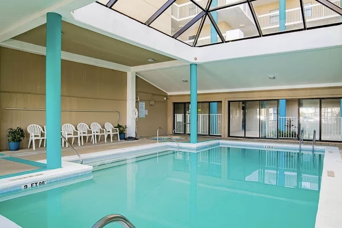 Indoor atrium pool - heated in winter! Beach towels also provided in your condo.