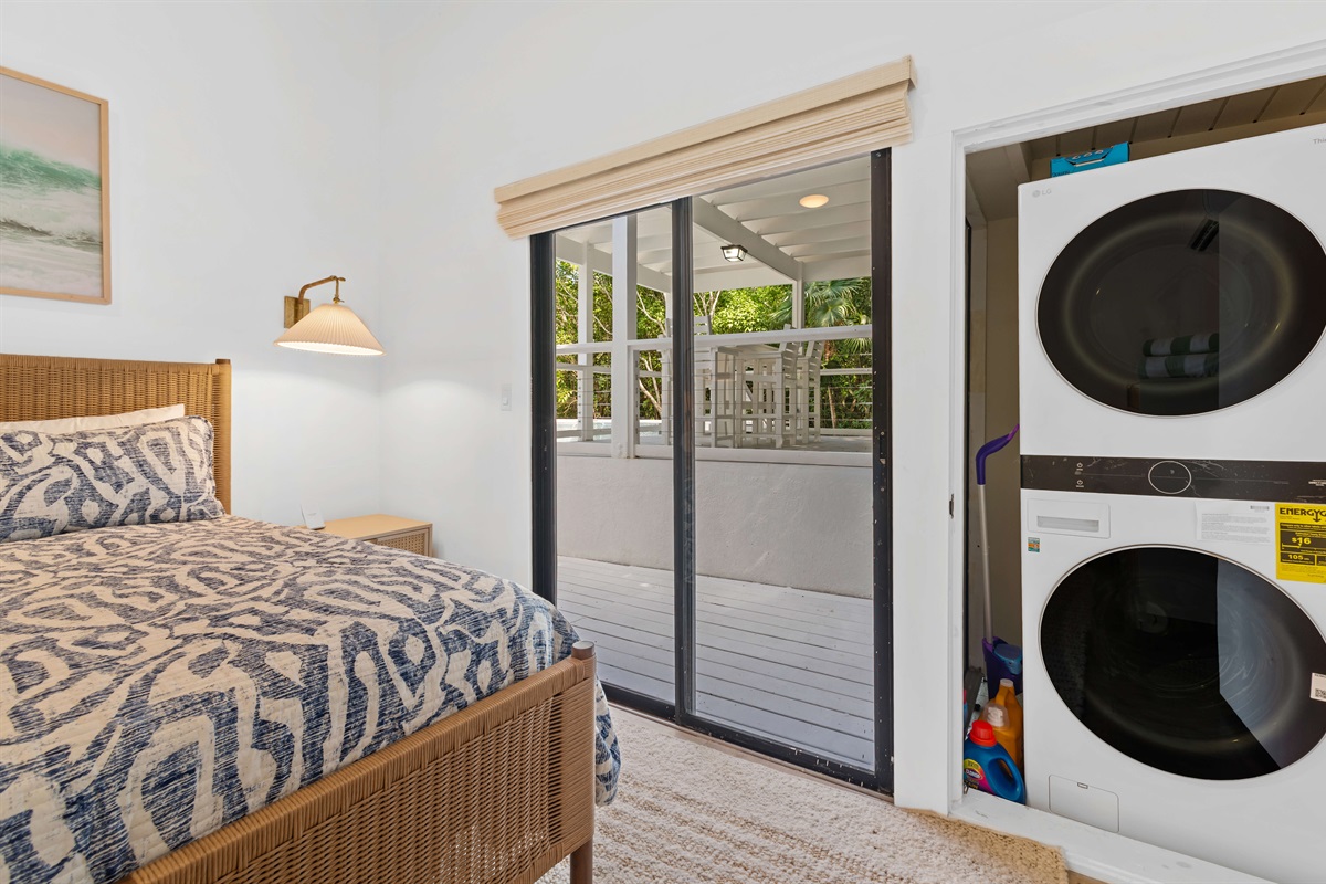 Washer and dryer in the closet of the guest bedroom for the convenience of the whole family