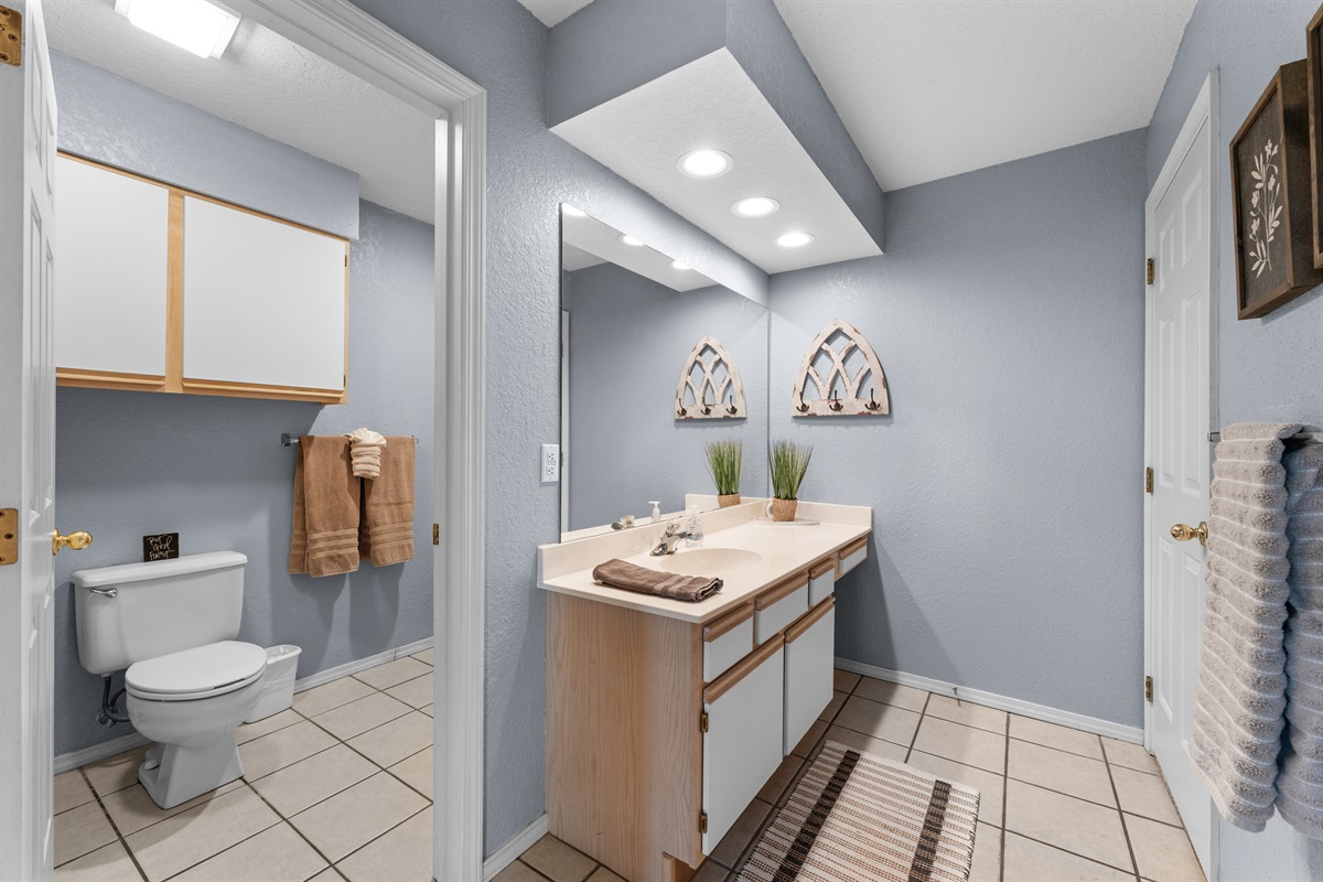 Double vanities in the primary bath make mornings easier when everyone is getting ready.