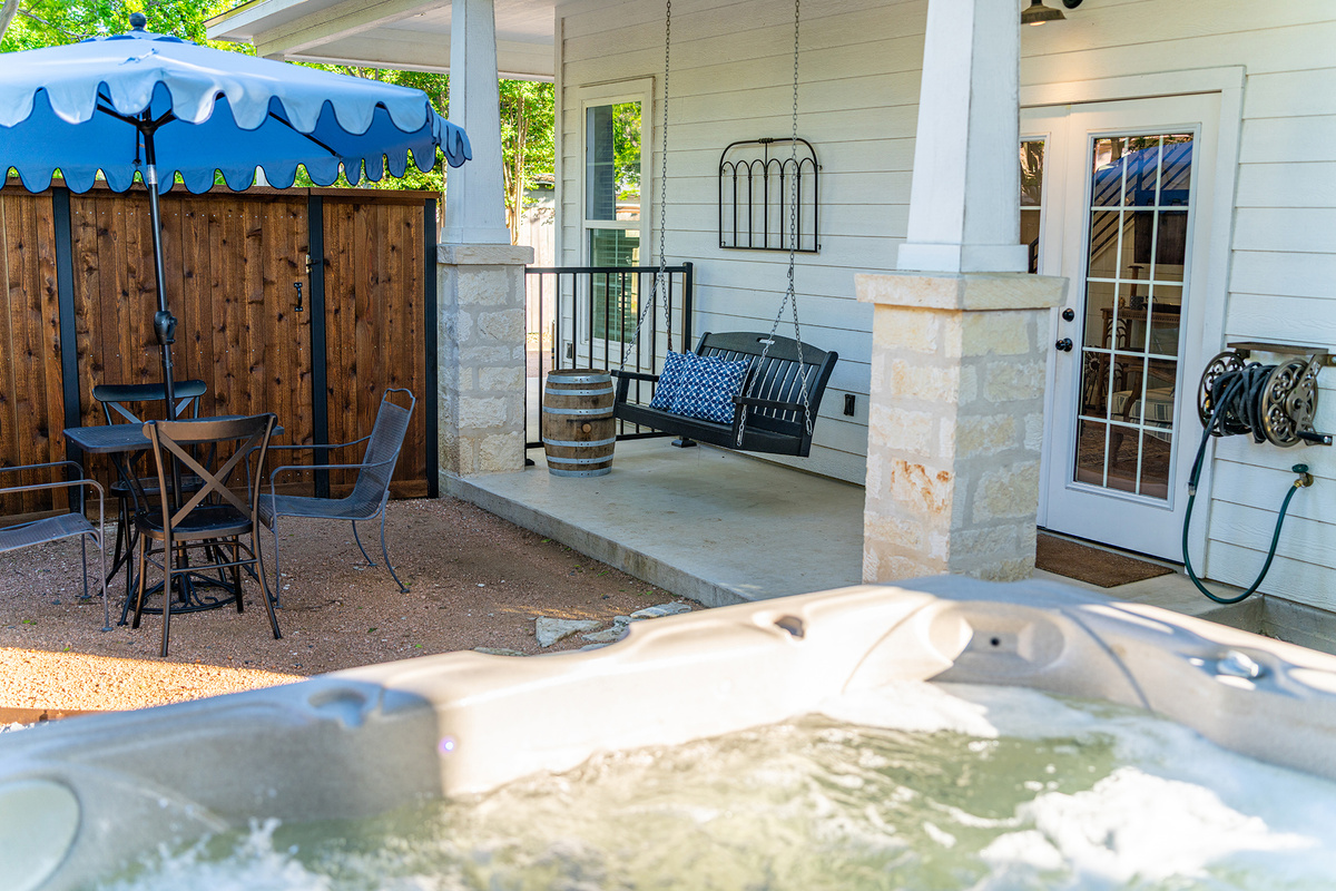 Unwind in your private hot tub after a day exploring Fredericksburg