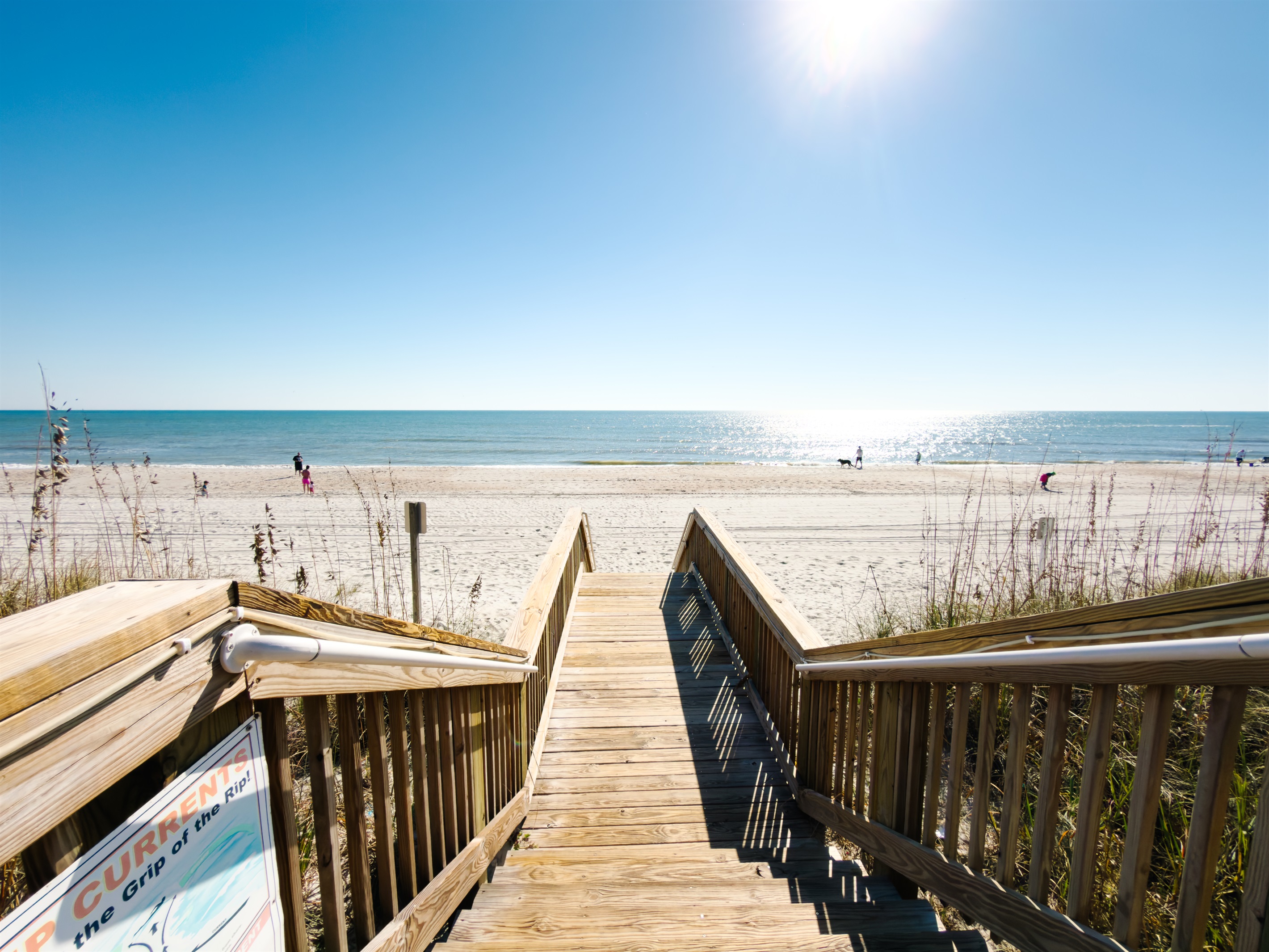 Direct resort access to miles of soft sand and shoreline.