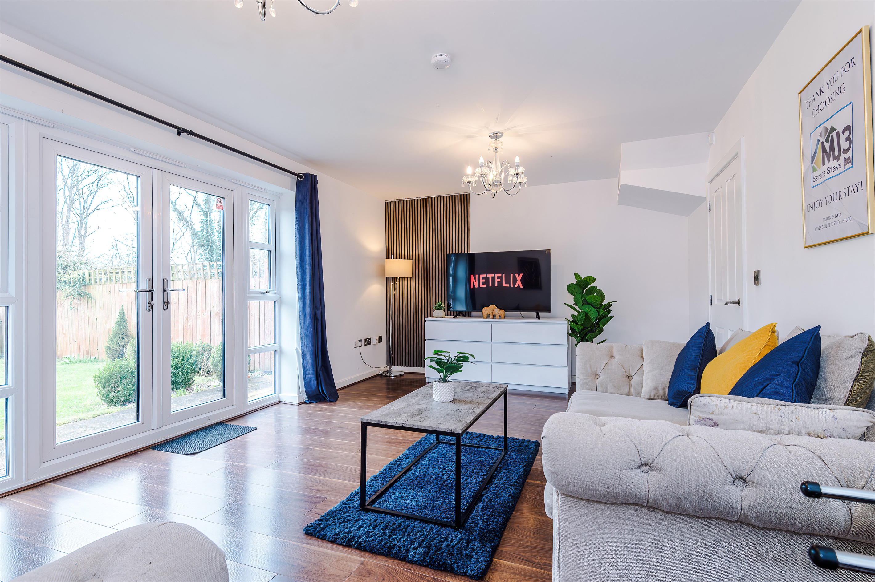 The spacious, bright and vibrant lounge benefits from a comfortable atmosphere and decor leading to the large rear garden via the French doors