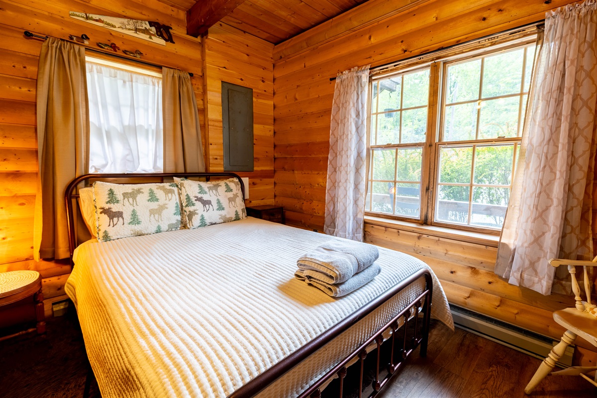 Find this queen-size bed in the private bedroom, perfect for resting after a day full of activities. 
