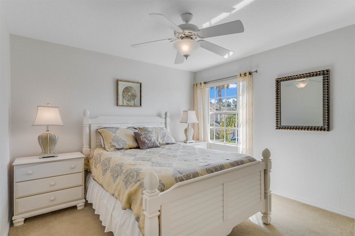 The second floor queen bedroom.