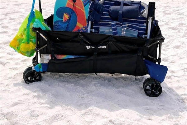 Beach supplies provided: at least 4 chairs, boogie boards, sand toys, umbrellas, nets for night time sand crabbing and a wagon to help haul it all to the beach! 