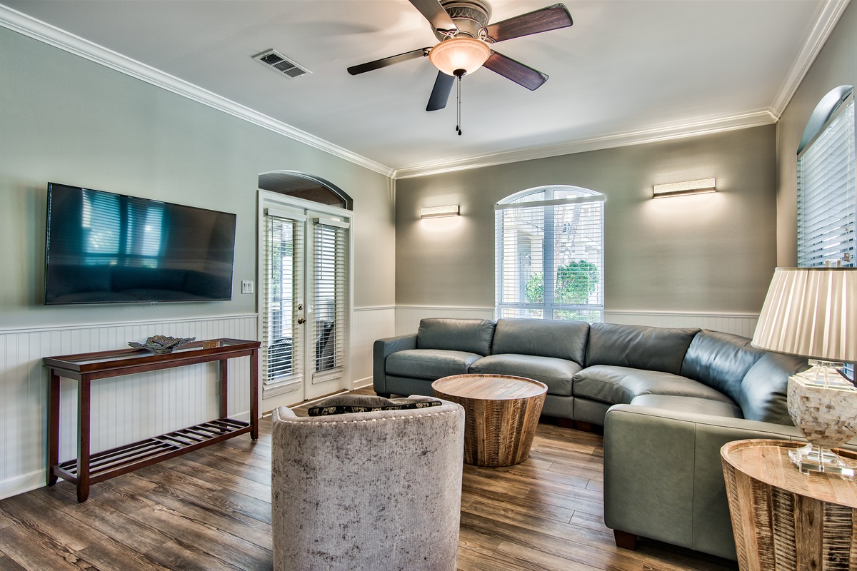 Bright living room with plush seating and Smart TV for family movie nights