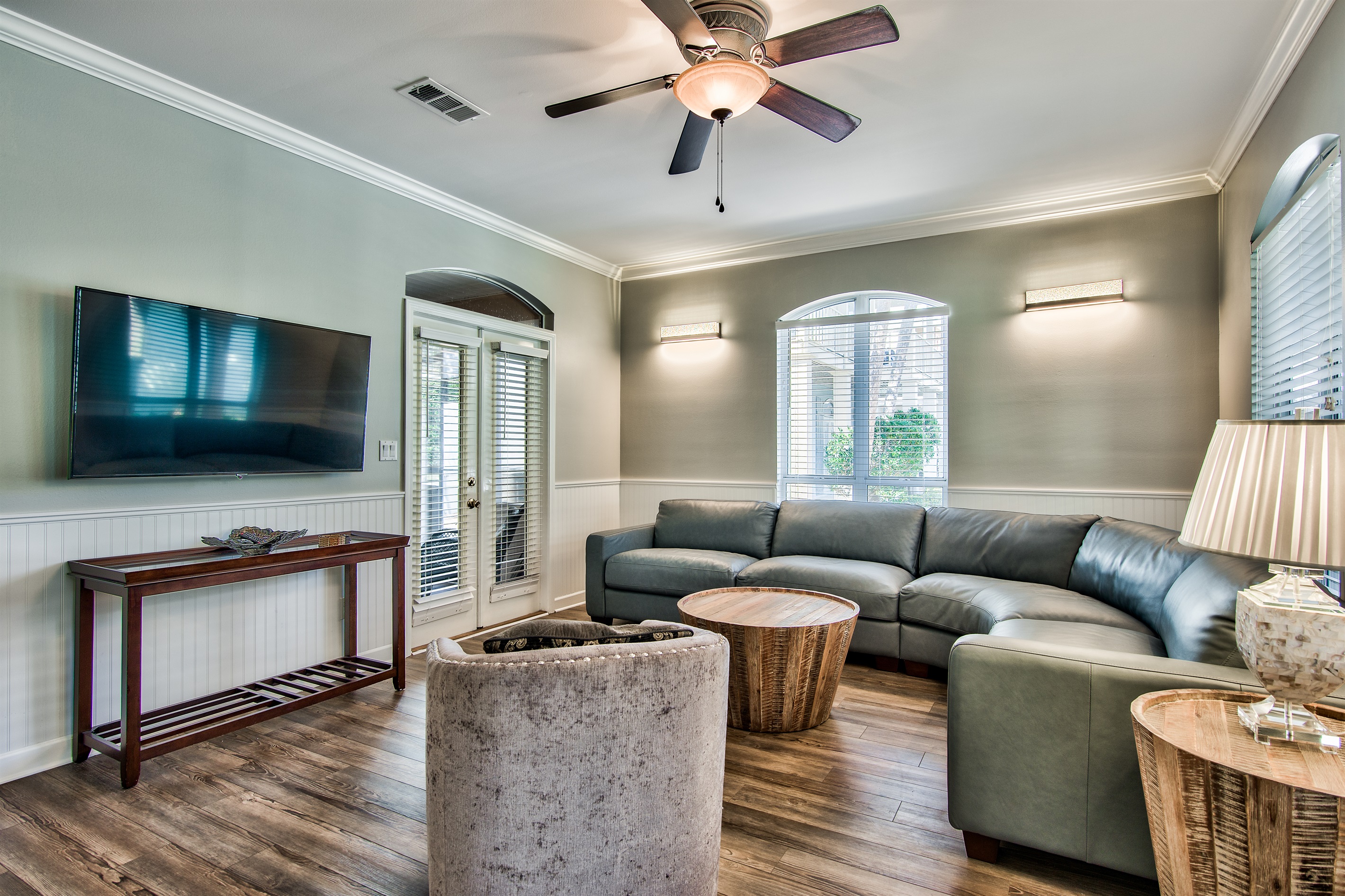 Bright living room with plush seating and Smart TV for family movie nights
