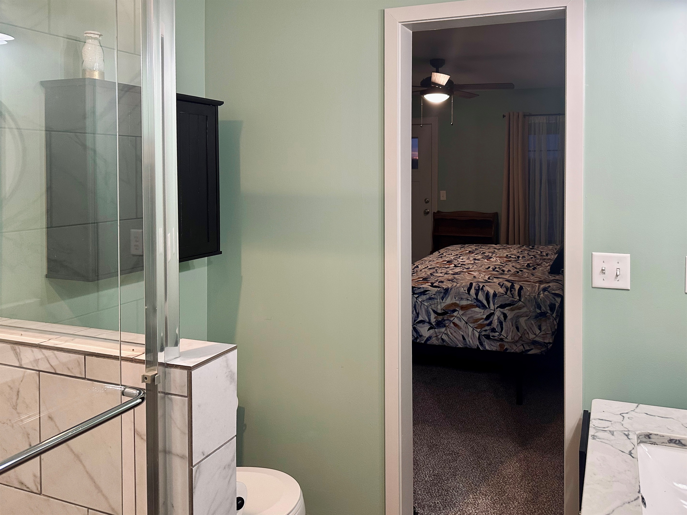 Private ensuite bathroom connected to the primary bedroom, offering convenient access and a seamless retreat-style layout.