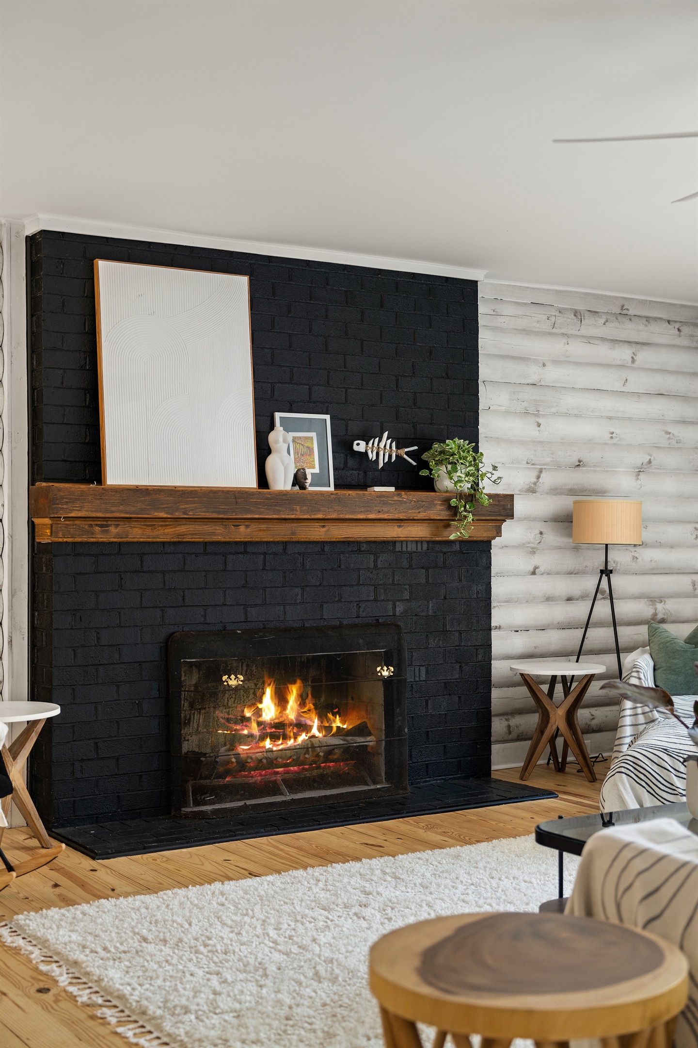 Living Room Retreat: Unwind by the fireplace in this stylish space with serene views!