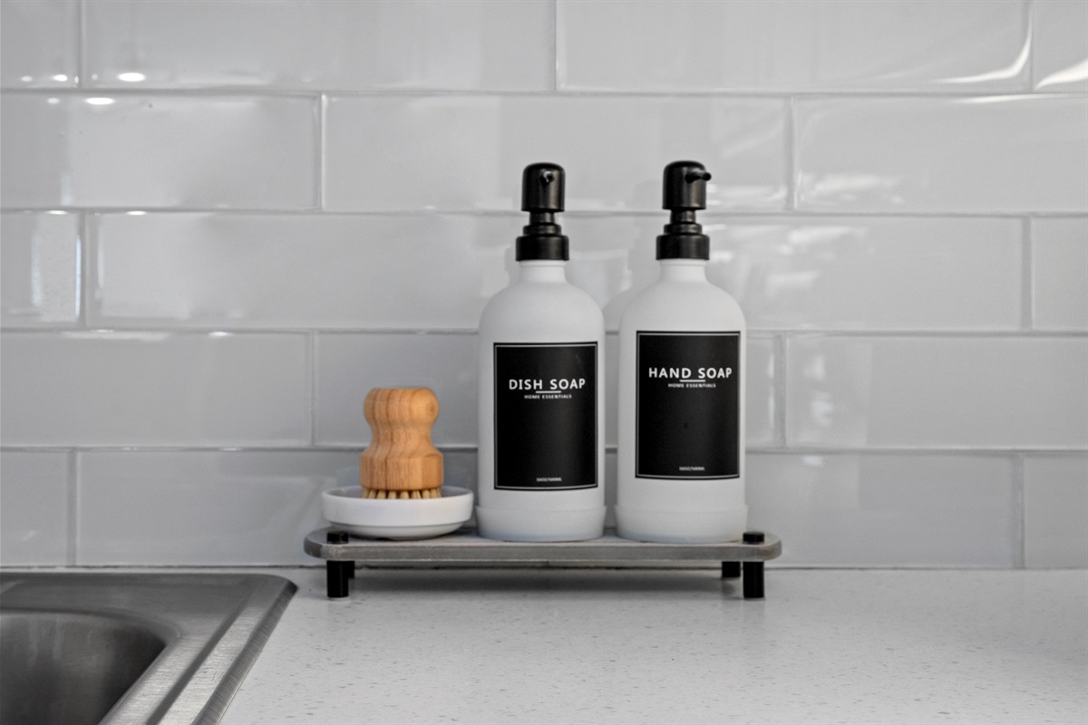 Guest-ready with sleek countertop essentials that blend style and convenience for a seamless stay.