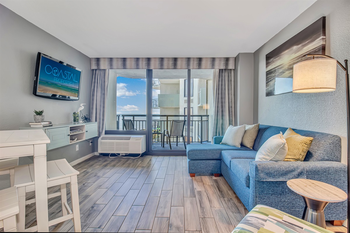 Engage in oceanview conversations from the comfort of the couch, where the living area is thoughtfully arranged to encourage socializing while savoring the sea vistas.