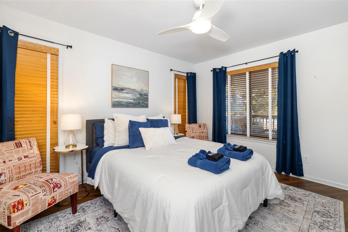 Charming Bedroom 1: Enjoy soothing views and stylish decor for a restful retreat in Henrico!