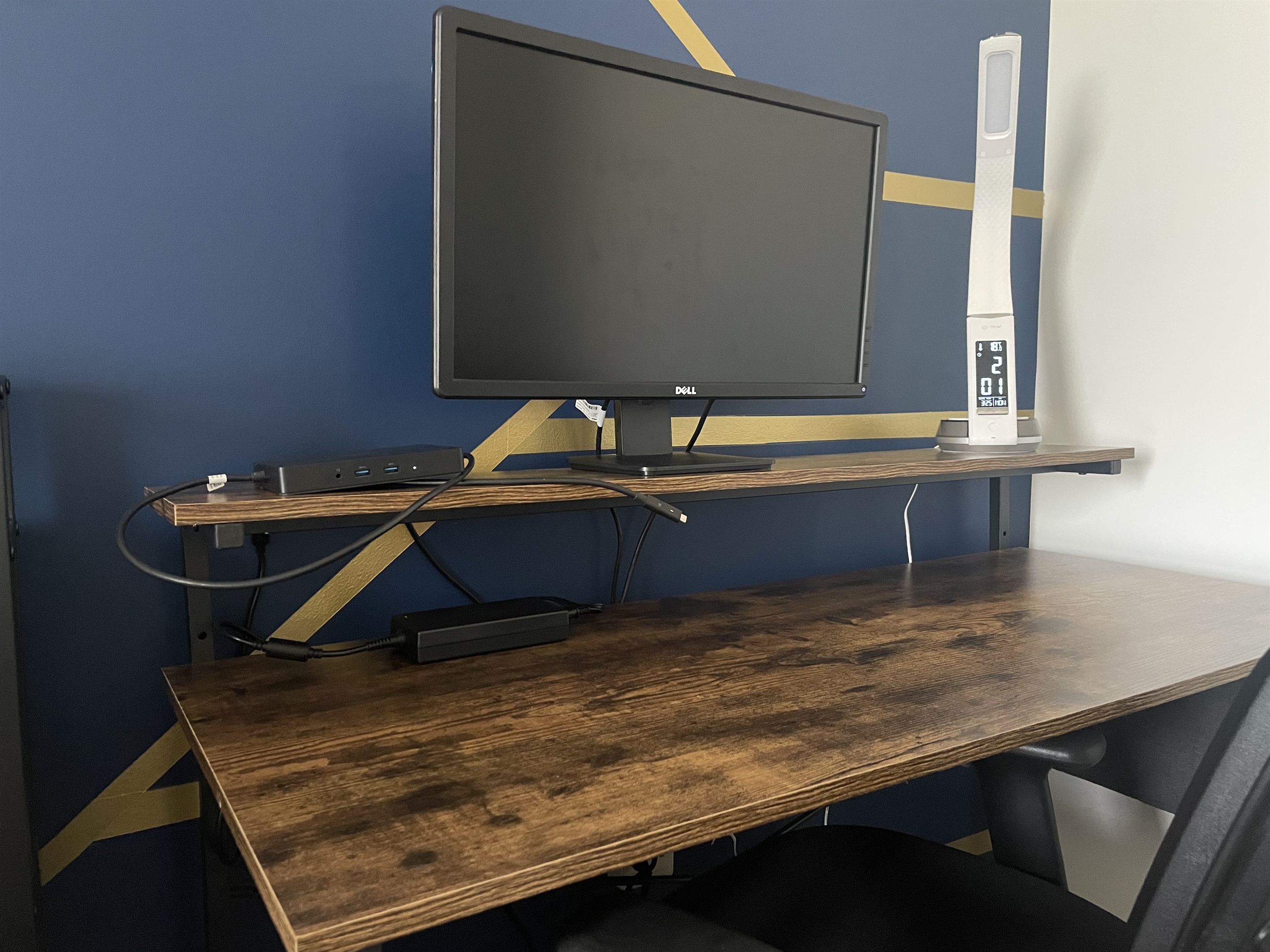 Dell monitor and dock is provided to guests who are on work trips