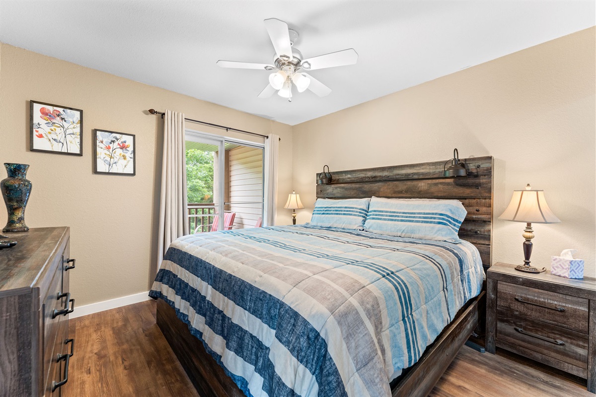 Rest easy in your spacious master bedroom with a king bed, complete with a peaceful view and private deck access.