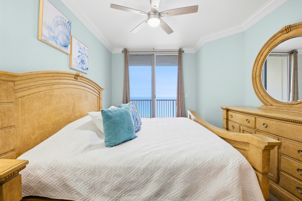 Wake up to peaceful morning light in this comfortable guest bedroom.