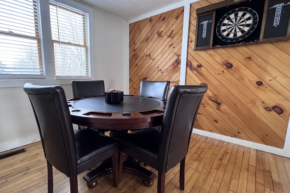 Game room just off of the living room with a poker table