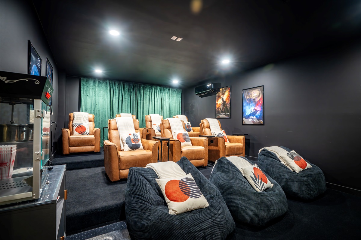 🍿 Just off the kitchen, you&rsquo;ll find our cozy home theater with 85" TV, reclining leather chairs and popcorn maker!!