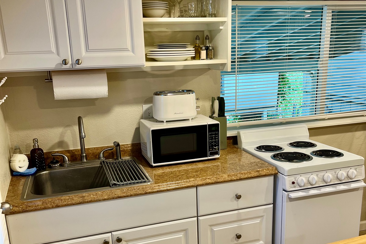 Enjoy the convenience of a private, fully equipped kitchenette—perfect for whipping up a meal or a morning coffee.