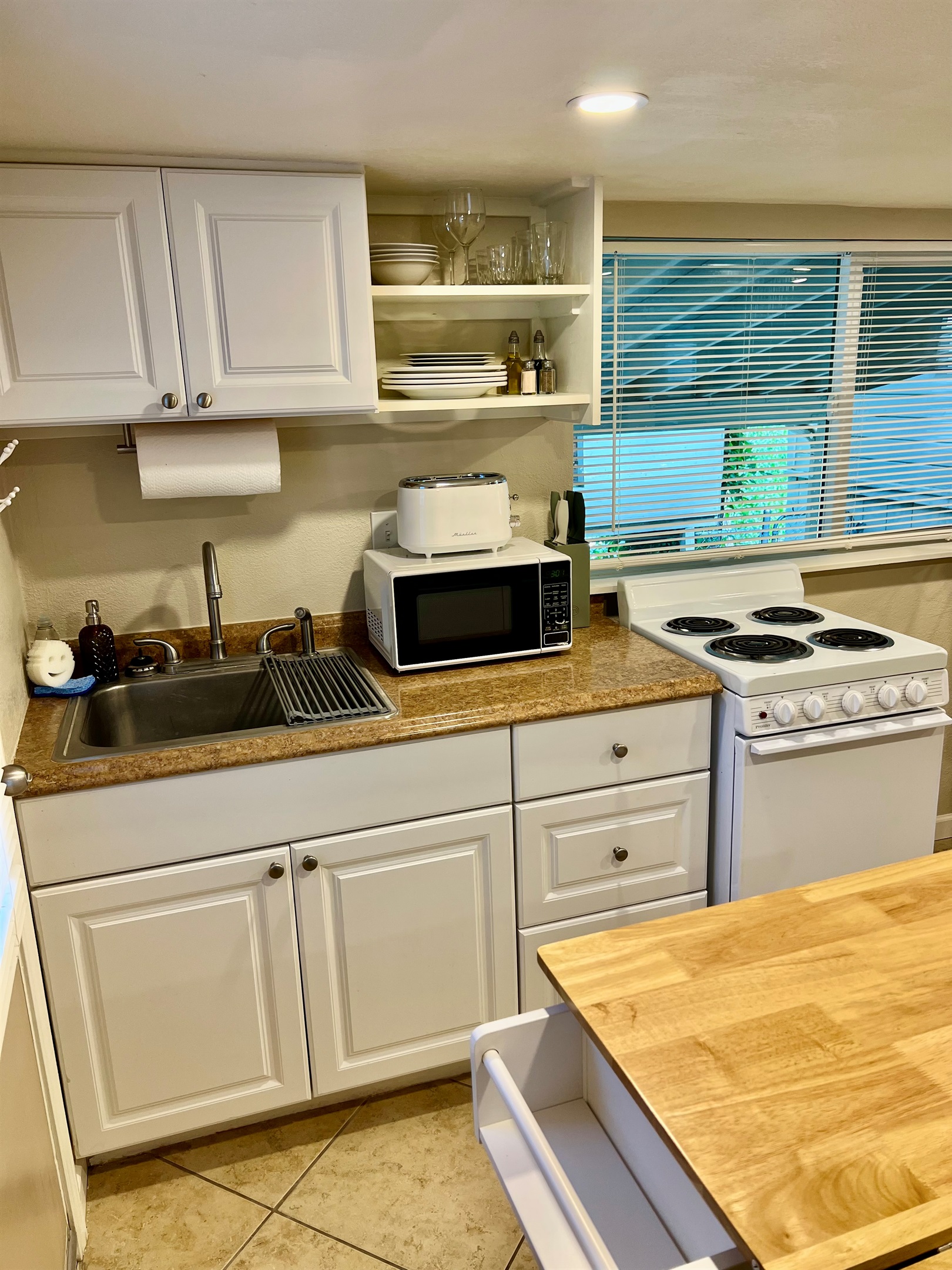 Enjoy the convenience of a private, fully equipped kitchenette—perfect for whipping up a meal or a morning coffee.