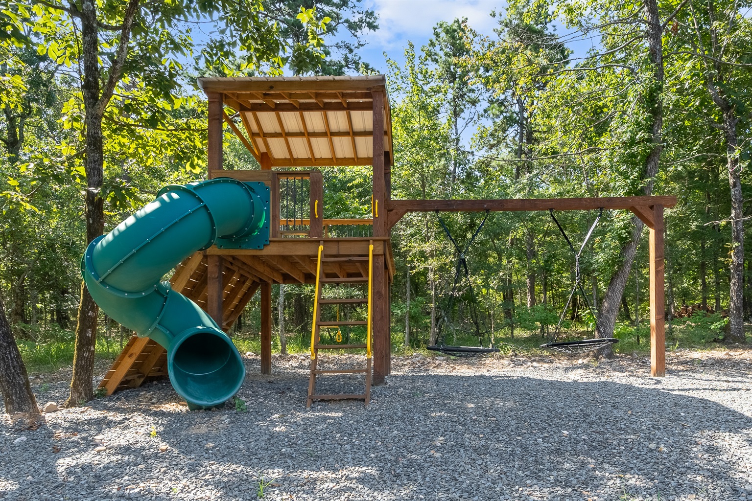 Kids love it in their large, personal tree house. Complete with slide, swings, and climbing wall