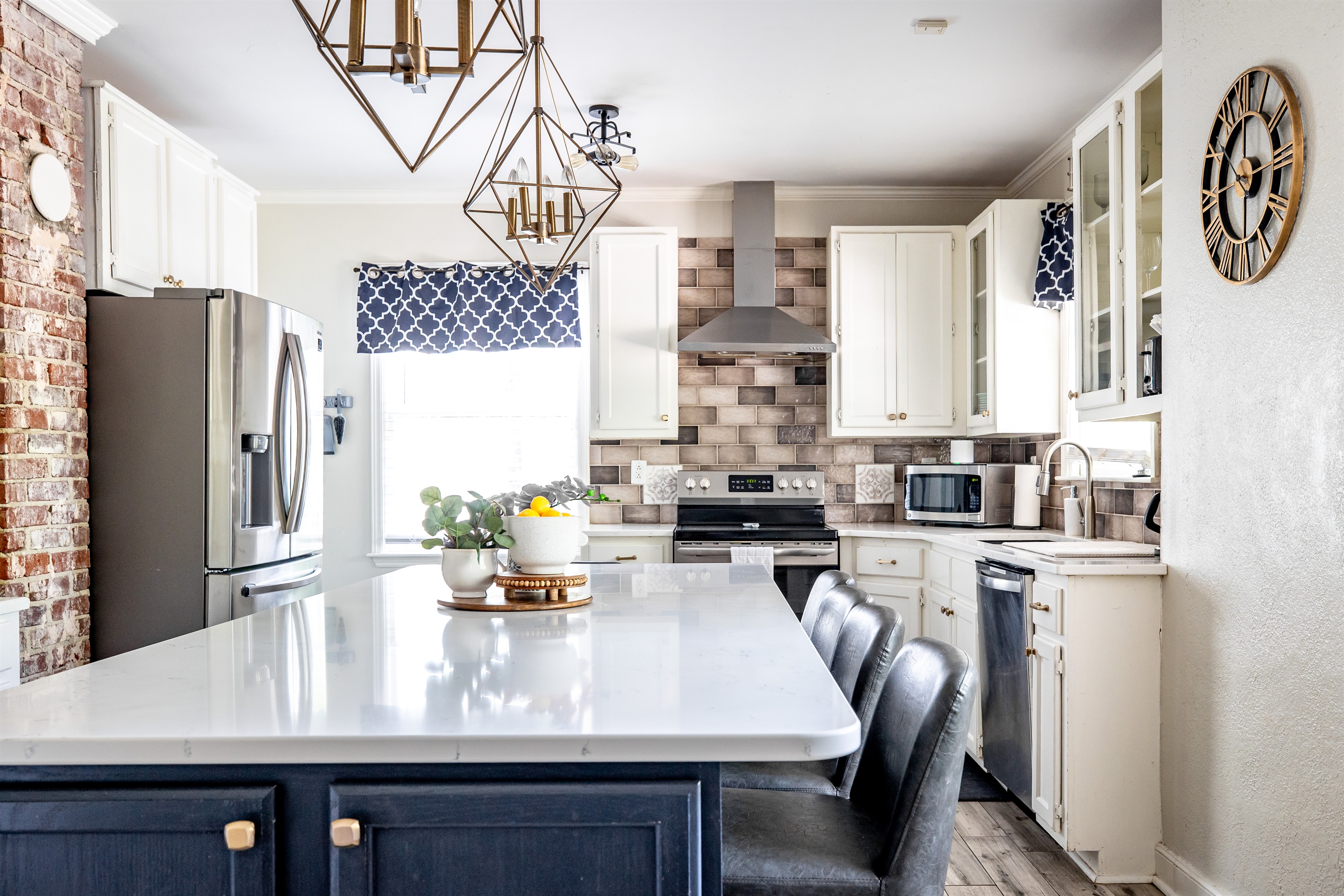 Kitchen with island and barstools