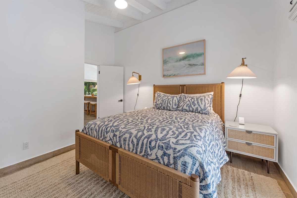 Guest bedroom right off of the living area with cozy island furnishing