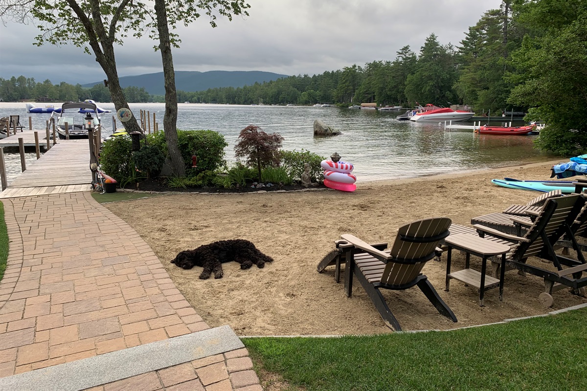 Walk in sandy beach overlooking lake and mountain views! Zero entry walk in to the water where the sandy bottom continues for hundreds of feet