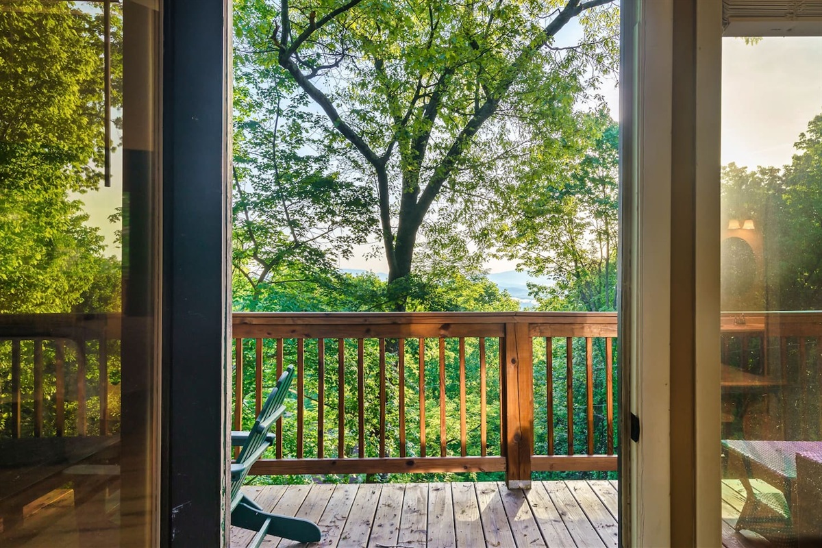 Walk out of the top level master bedroom, onto your own private balcony. Enjoy a peekaboo seasonal mountain view when the forest foliage is less full (seasonal only).