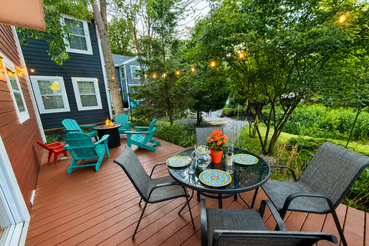 Enjoy dinner outdoors, gather around the fire table, or relax under the string lights after a day at the beach.