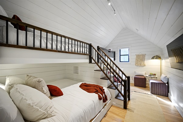 Large bunkroom with kings on the bottom and twins on top.