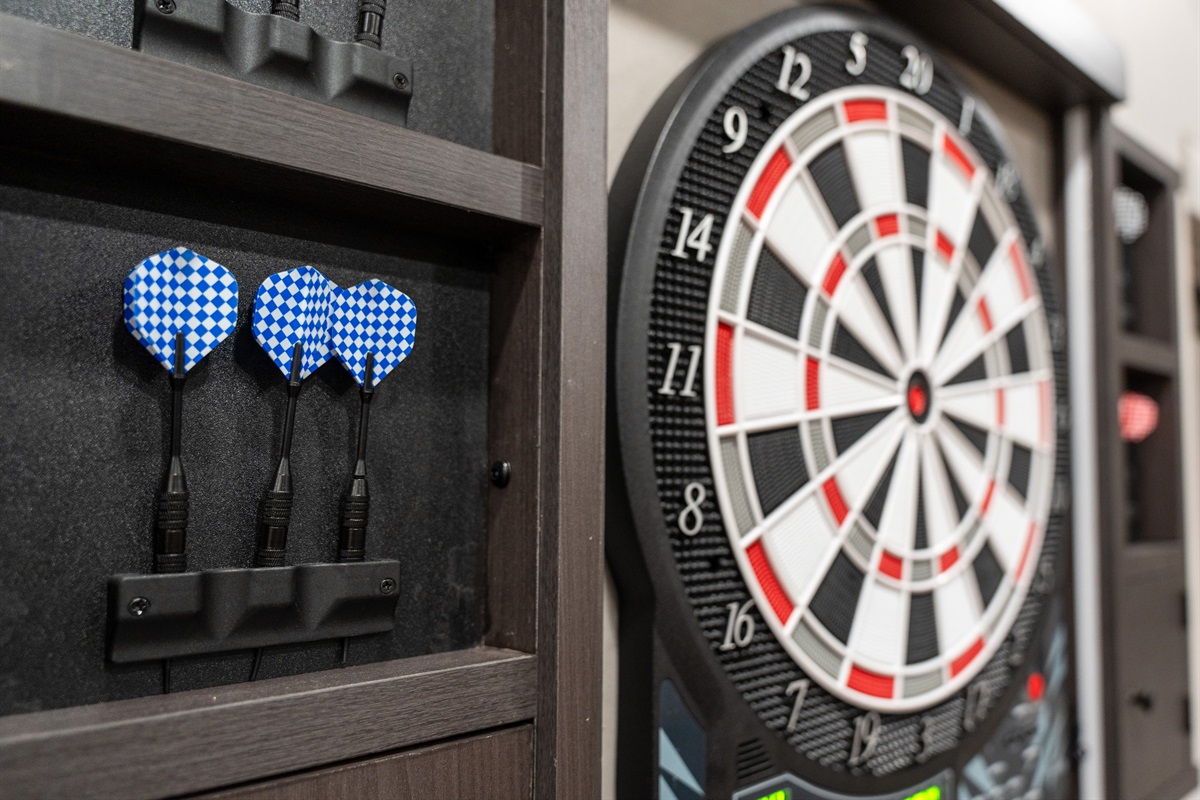 Classic dart board setup adds another fun option for game nights and group gatherings.