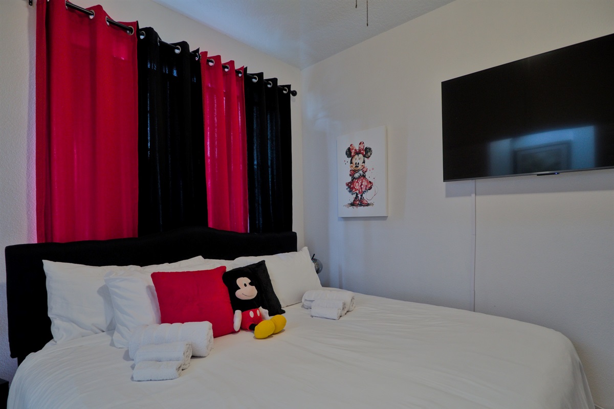 Mickey and Minnie room with king bed.