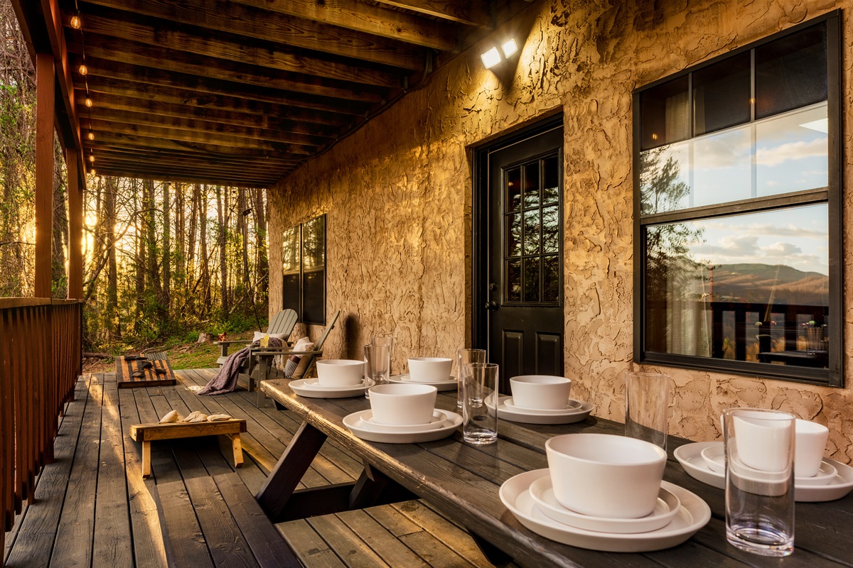 We gather around the table to enjoy dinner and enjoy family time as the sun sets over the mountains.