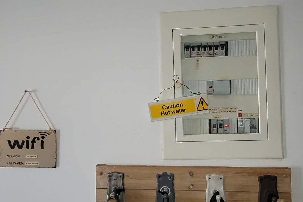 Electrical box at the top of the staircase