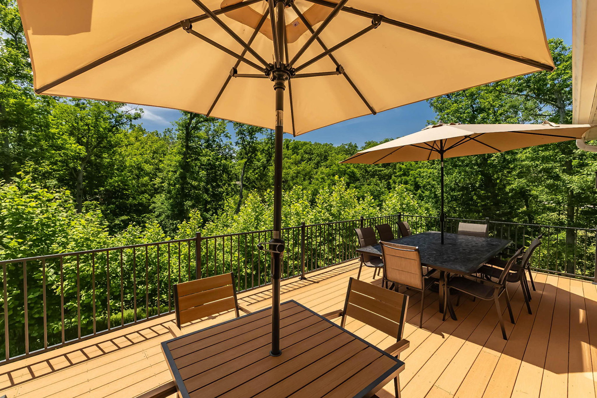 Large deck offers multiple places to gather and relax.