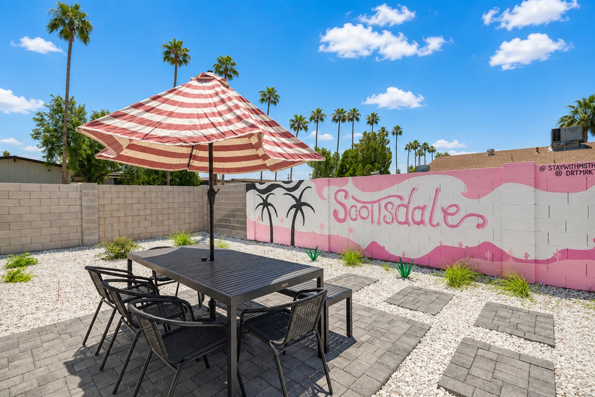 Escape the hustle of the day in the back yard oasis!