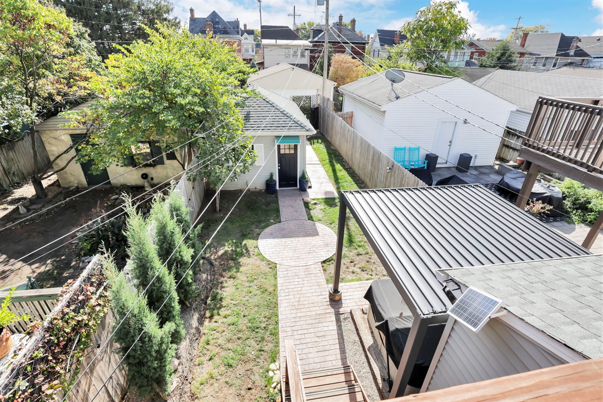 View of the back yard from the upstairs balcony
