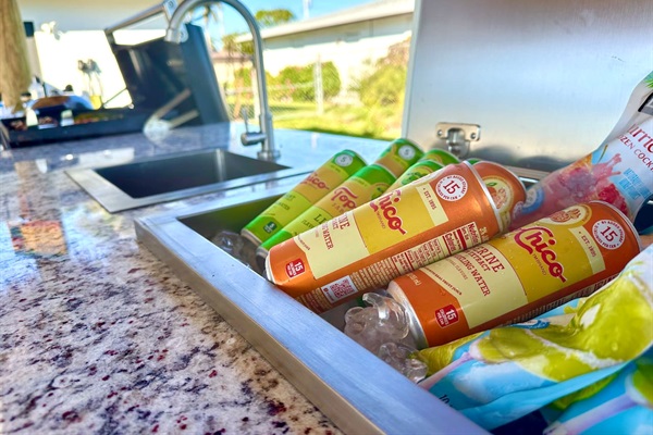built in ice chest for cold drinks by the grill